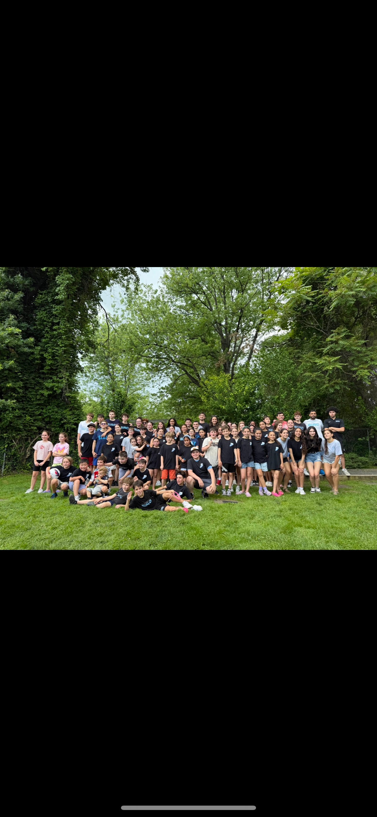 SIAC team group photo with young swimmers